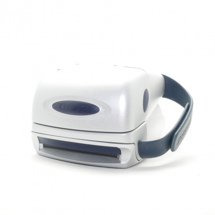 Used Polaroid 600 Series Instant Print camera, silver Used Polaroid 600 Series Instant Print camera, silver