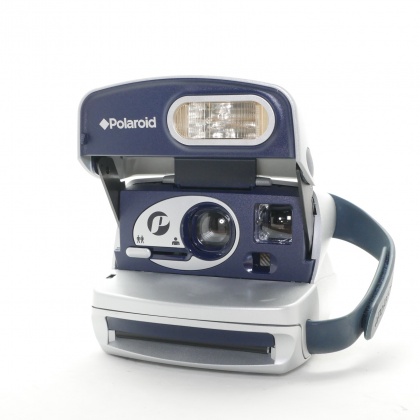 Used Polaroid 600 Series Instant Print camera, silver Used Polaroid 600 Series Instant Print camera, silver