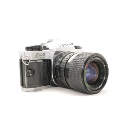 Used Canon AE-1 Program 35mm SLR with Tokina 35-70mm lens Used Canon AE-1 Program 35mm SLR with Tokina 35-70mm lens